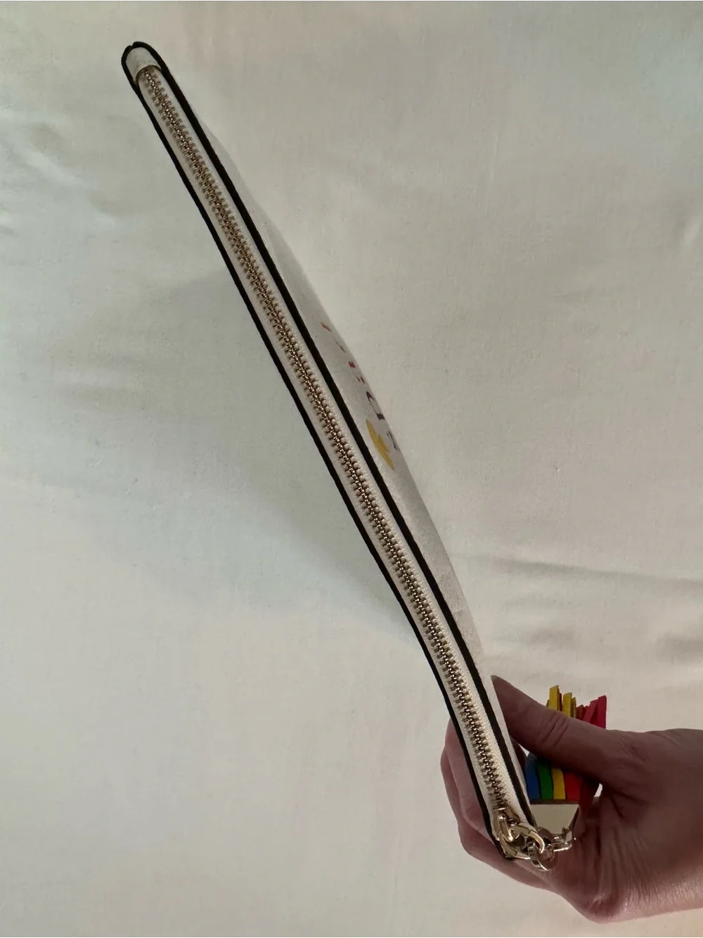 kate spade Kourtney Pride Clutch, White with Rainbow Logo and Tassel